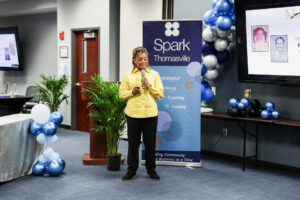 Charlene Hampton pitching MarBen5 Charters at Spark Tank 2025—turning a childhood sense of belonging into a business vision.